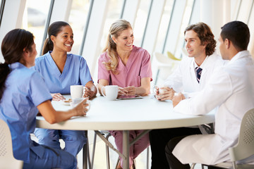 Fototapeta premium Medical Staff Chatting In Modern Hospital Canteen