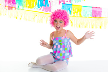 child kid girl with party clown pink wig funny expression