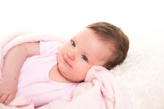 baby girl smiling dress in pink with white fur