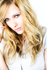 Fototapeta premium Portrait of blond woman with long hair