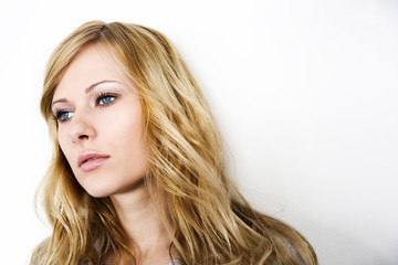 Naklejka premium Closeup of blond woman on white background