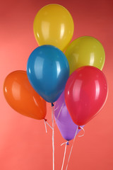 colorful balloons on red background