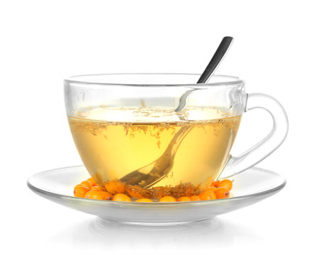 buckthorn broth in a glass cup isolated on white
