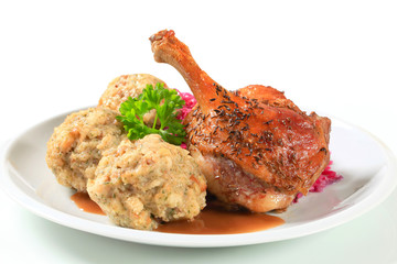 Roast duck with Tyrolean dumplings and red cabbage