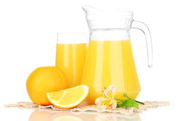 Full glass and jug of orange juice and oranges isolated on