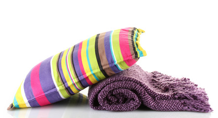 Warm plaid and color pillow, isolated on white