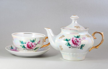 Antique floral porcelain tea pot and cup - 48290540