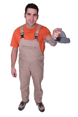 Handyman holding tool