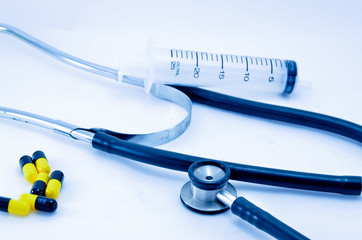 Medical: Pills , Syringe and Stethoscope