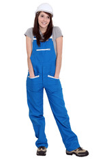 A cute brunette in her overalls.