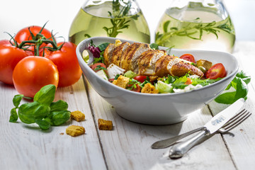 Fresh salad with chicken, tomato and olive