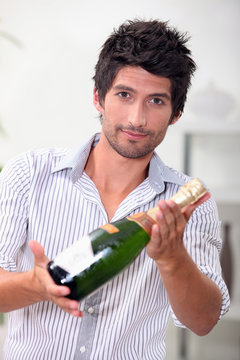 Man With Bottle Of Champagne