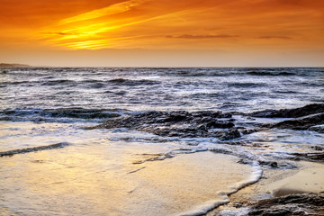 Obraz premium Sunset over the Atlantic Ocean