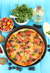 colorful composition of delicious pizza, vegetables and spices