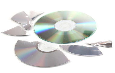 Broken and whole disks with information isolated on white
