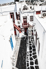 A typical narrow alley in the town of Mykonos, Greece