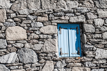 A typical narrow alley in the town of Mykonos, Greece