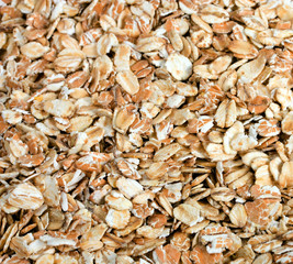 Oat flakes heap background
