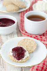 Scone with goat cheese and jam for breakfast