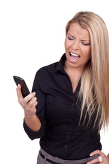 Woman looking at her mobile in frustration