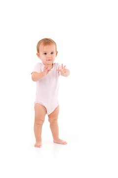 Cute baby standing unstable