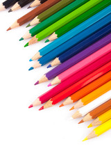 Colorfull crayons on white background.