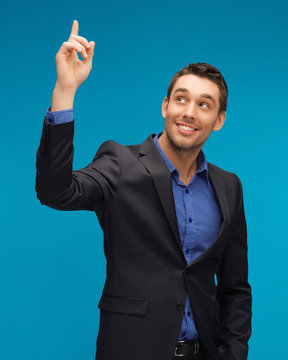 Man In Suit With His Finger Up