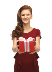teenage girl in red dress with gift box