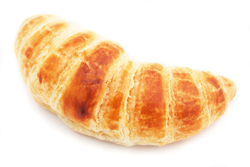 One croissant isolated on white