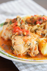 Chicken stew with tomatoes and onions