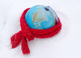 red scarf earth globe sphere winter snow concept