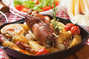 Rolled meat skewer with oven roasted vegetables