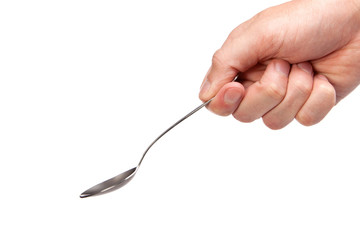 Hand is holding a spoon isolated