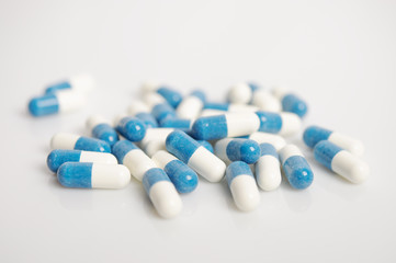 in white blue capsules