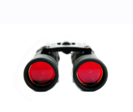 closeup of isolated binoculars with red lenses