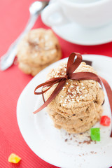 cookies with nuts and chocolate, a cup of tea