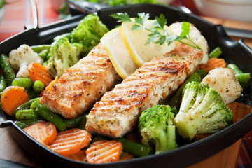 Grilled salmon steak and vegetables