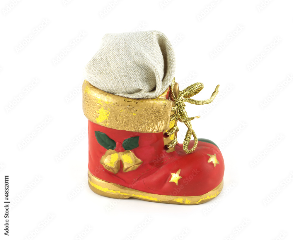 Wall mural Red Christmas toy bootee with gift isolated on white