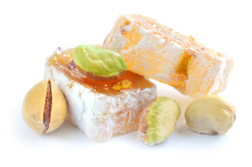 Turkish delight (lokum) with pistachios on a white background