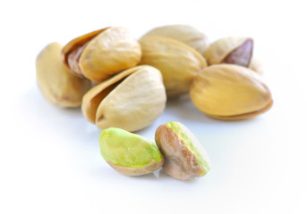 Pistachio nuts on white background