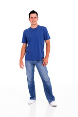 casual young man full length portrait on white