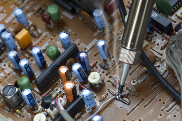Soldering iron and verification testing of electronic boards