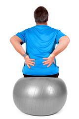 Obraz premium Man with exercise ball