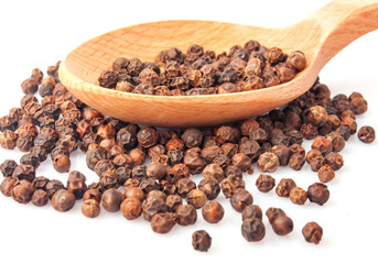 spoon with pepper seeds