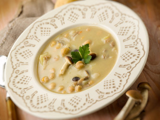 soup with chickpeas mushroom and potatoes, selective focus
