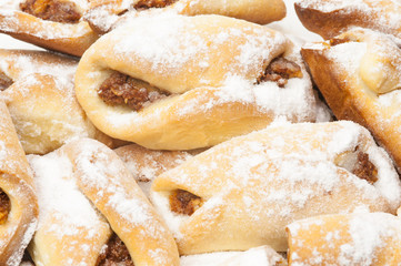 Apple savory pastry with powdered sugar on top
