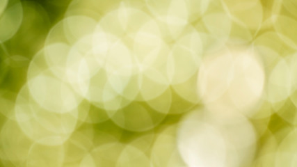 Bokeh background with defocused green  and yellow lights