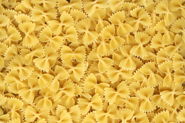 Some farfalle pasta as background pattern