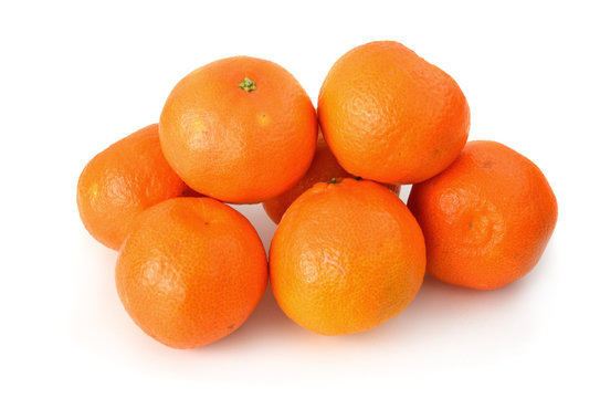 A couple of clementines on white background