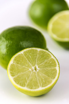 Close-up of cut lime isolated on white